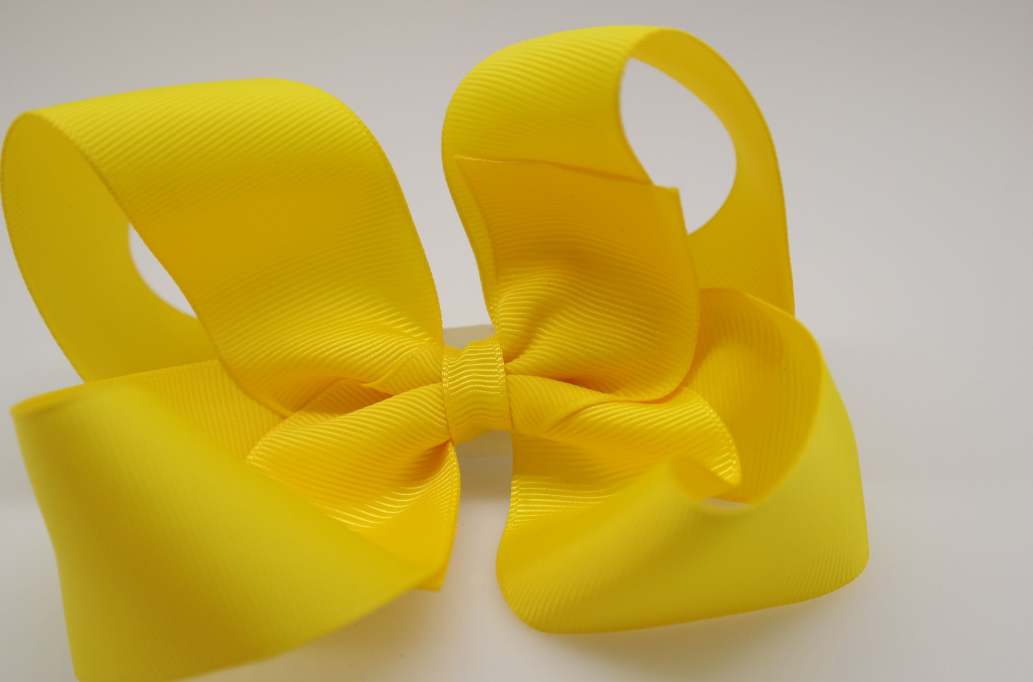 Itty bitty tuxedo hair bow Color: Daffodil Yellow